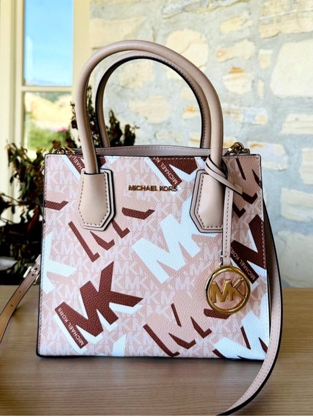 Michael Kors logo Mercer messager in buff multi with gold hardware NWOT